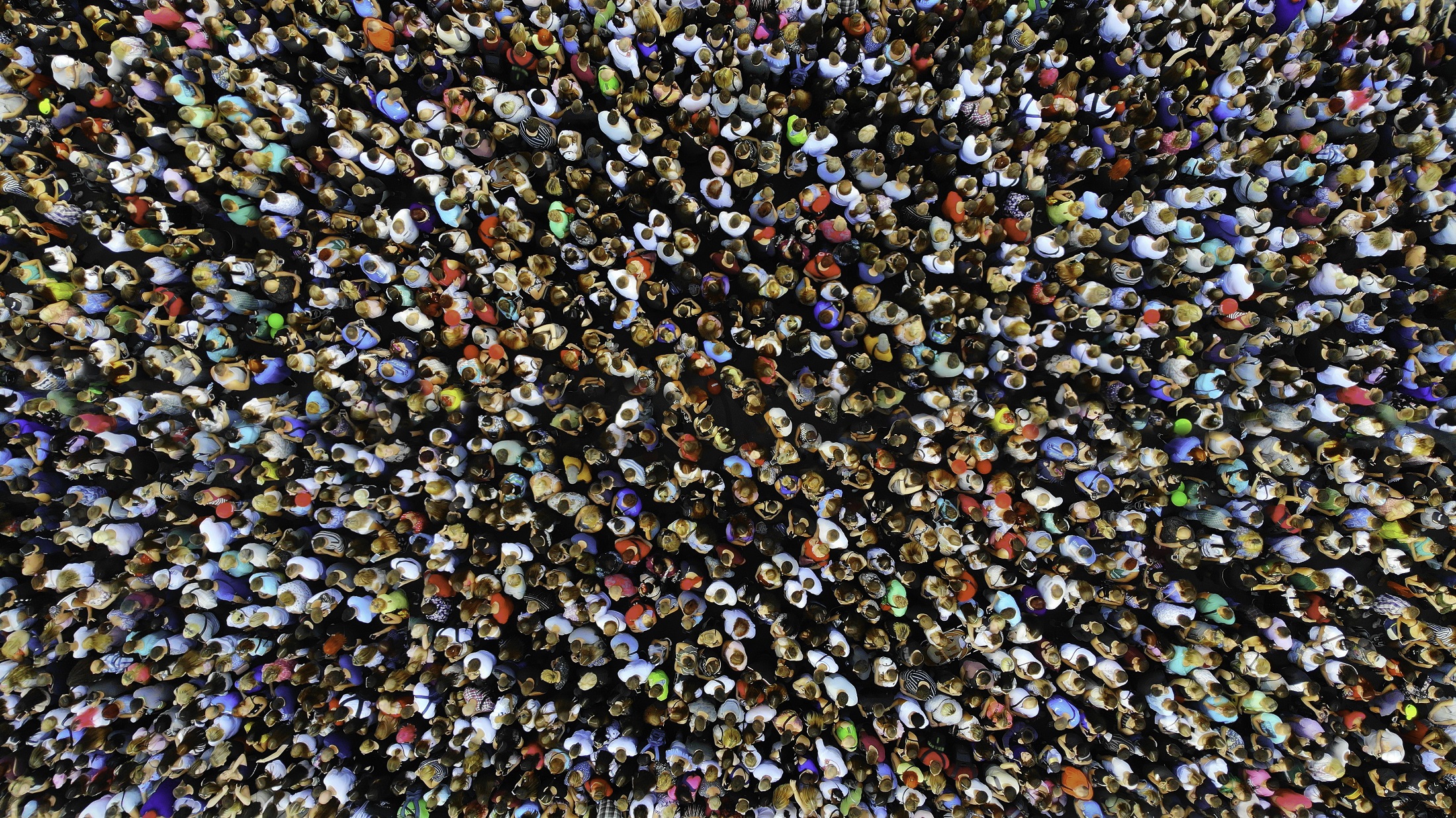 abstract image of large crowd from overhead