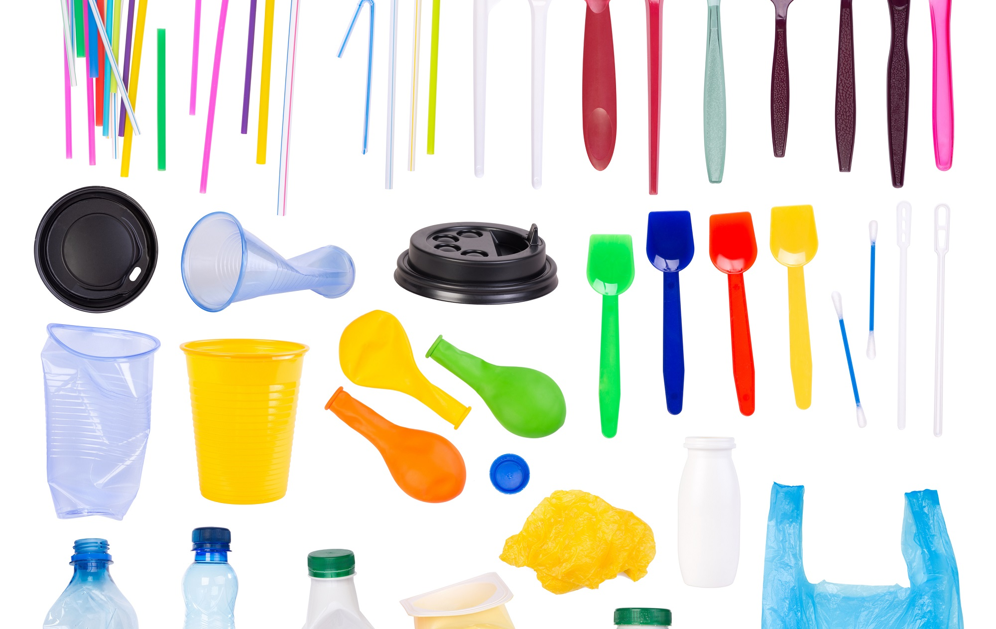 composition image showing typical plastic waste such as straws, cutlery and containers