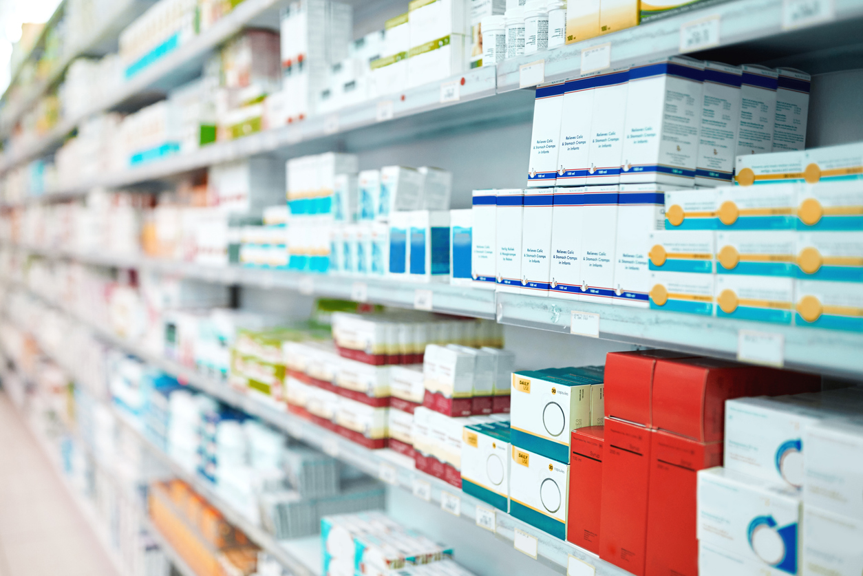 shelves of medications in a pharmacy
