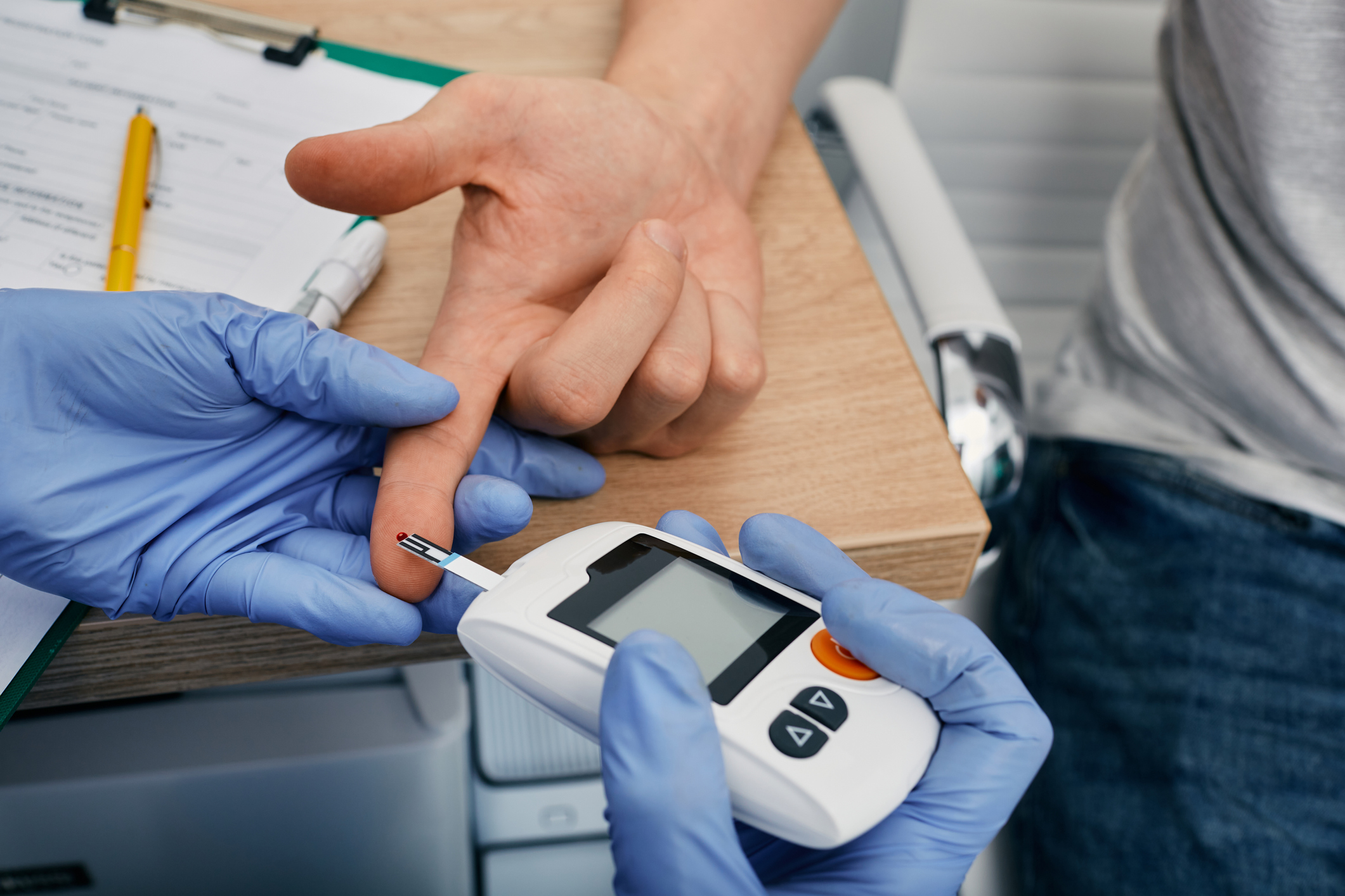 photo of finger prick blood test for glucose level 
