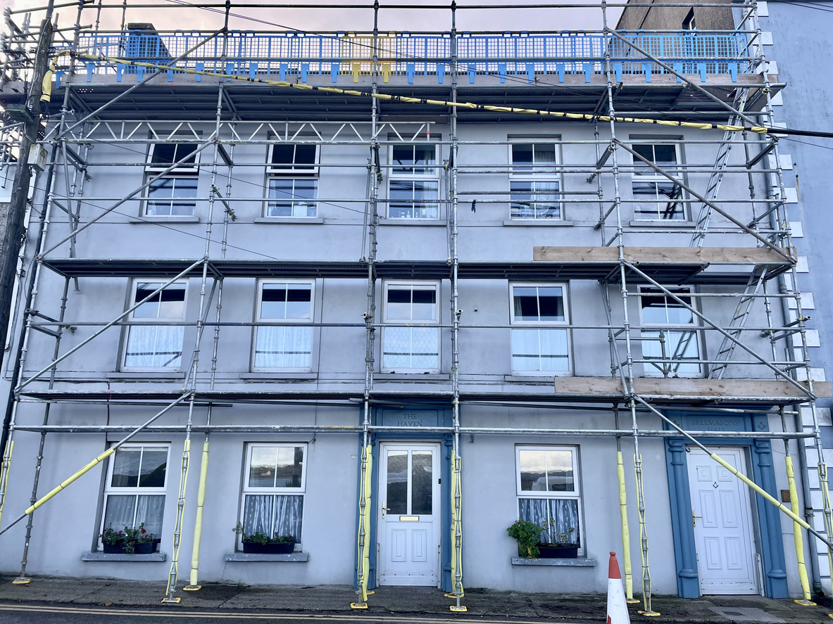building with scaffolding on the front