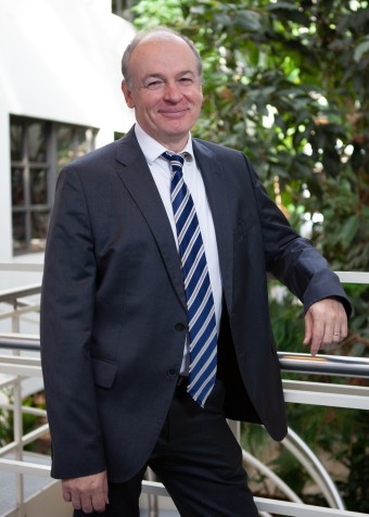 A man dressed professionally in a suit.