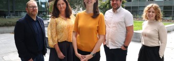 Image of 5 people standing outside 