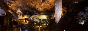 Stalactites hanging from the ceiling at Crag Cave