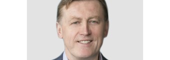 close up image of Mr Vincent T Roche dressed formally.