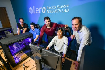 Group of people in a gaming room testing lero gaming skills