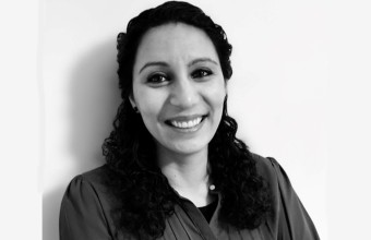 A picture of women smiling in black and white