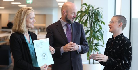picture of Dr Marion Boland, Professor Philip Nolan and Dr Suz Garrard holding the SFI's EDI strategy.
