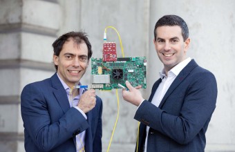 Two men launching a new research partnership to explore 5G and 6G optical networks